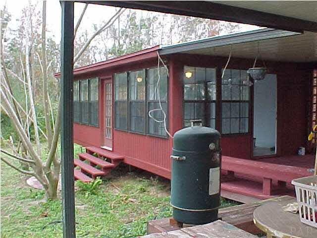 1399 Wishbone Road Cantonment, FL 32533 - Photo 5 of 18 BACK VIEW OF THE FLORIDA ROOM