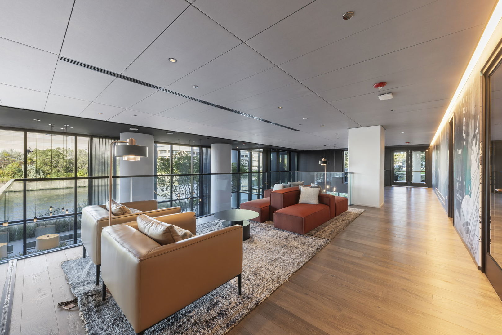 234 West Polk Street, Unit 2610 Chicago, IL 60607 - Photo 28 of 43 a living room with furniture fireplace and large windows