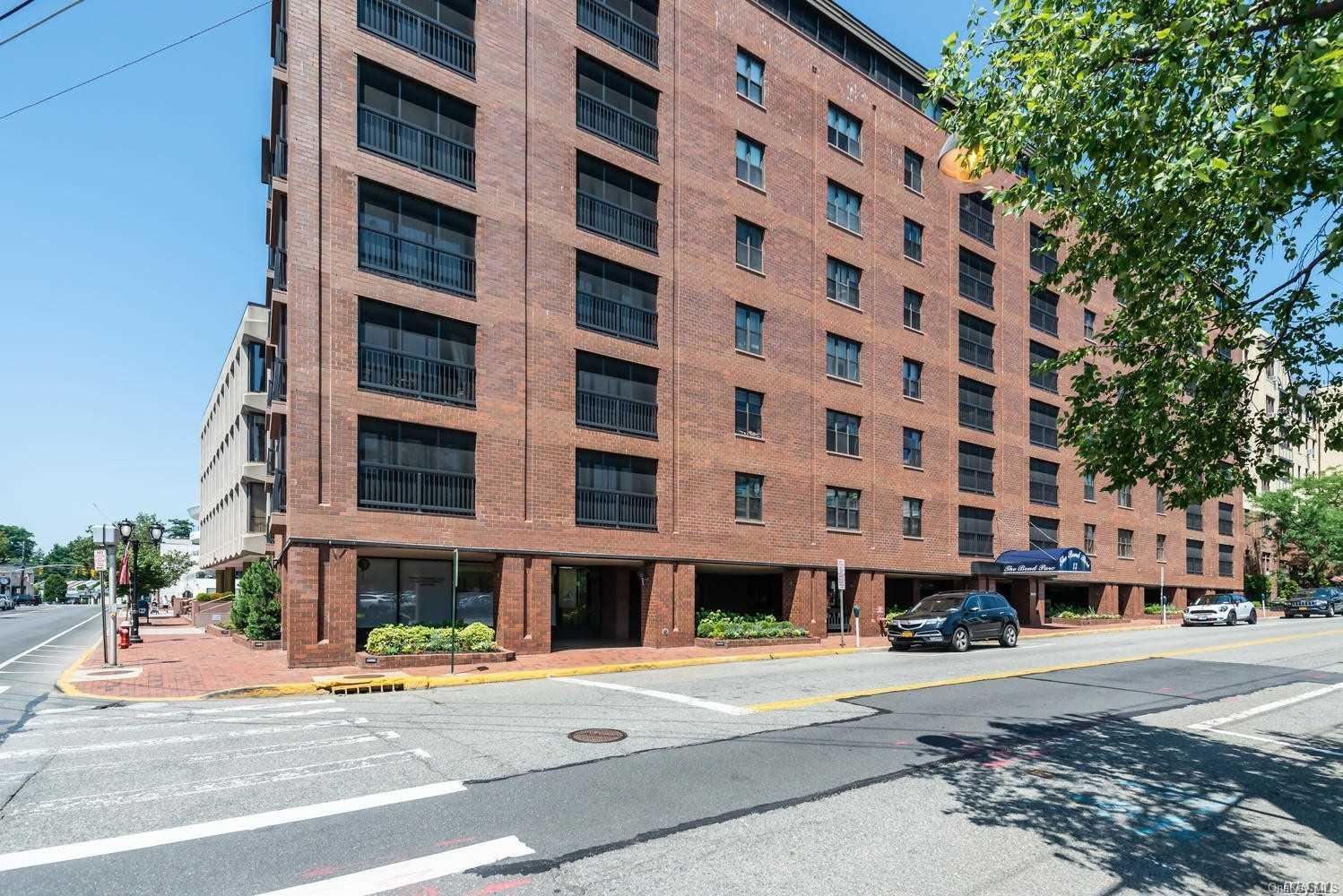 12 Bond Street, Unit 5A Great Neck, NY 11021 - Photo 1 of 1 a view of a building with a street