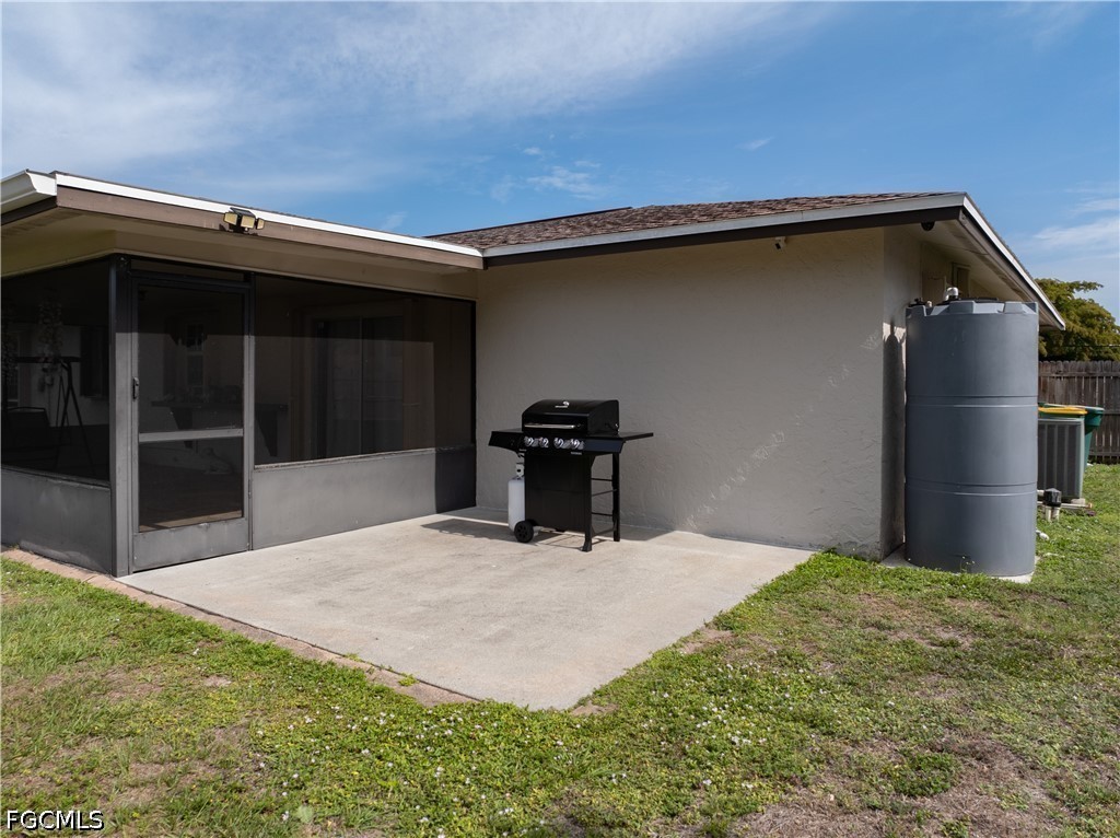 4960 20th Place Southwest Naples, FL 34116 - Photo 24 of 33 a view of a back yard of the house