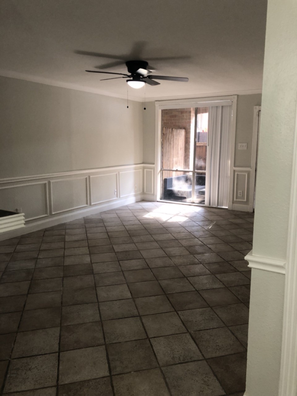 4641 Wild Indigo Street, Unit 439 Houston, TX 77027 - Photo 6 of 10 a room with a black white checkered floor