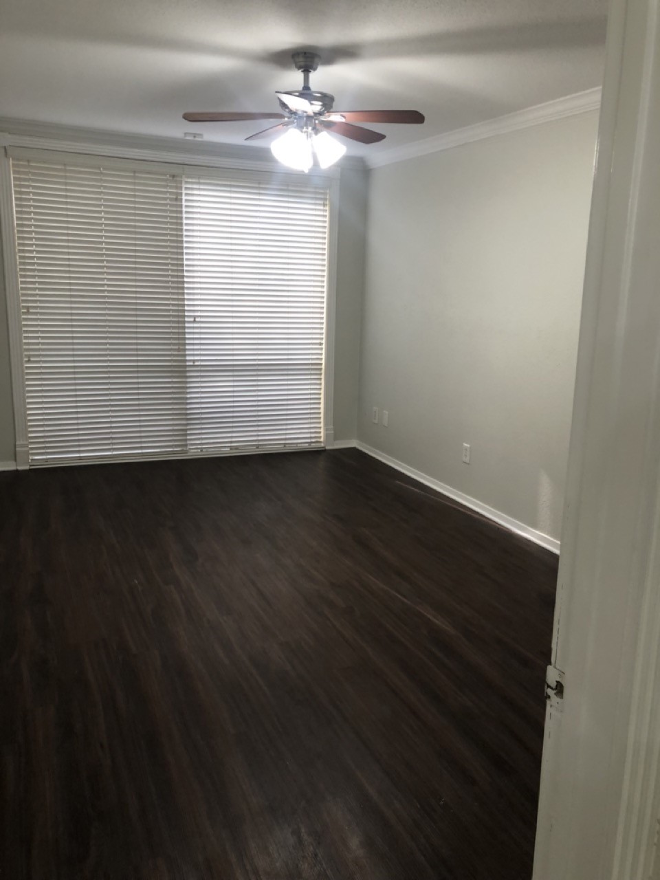 4641 Wild Indigo Street, Unit 439 Houston, TX 77027 - Photo 8 of 10 wooden floor in an empty room