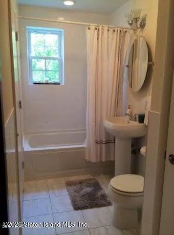 3871 Amboy Road, Unit 404 Staten Island, NY 10308 - Photo 8 of 17 a bathroom with a sink a toilet and shower