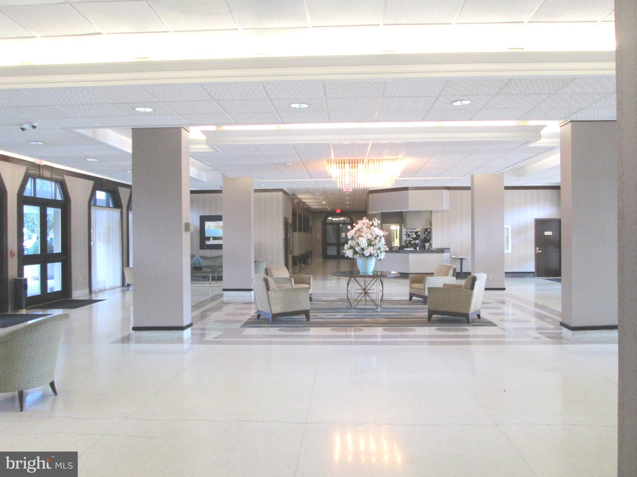 700 7th Street Southwest, Unit 327 Washington, DC 20024 - Photo 2 of 32 Lobby w/ Concierge Desk