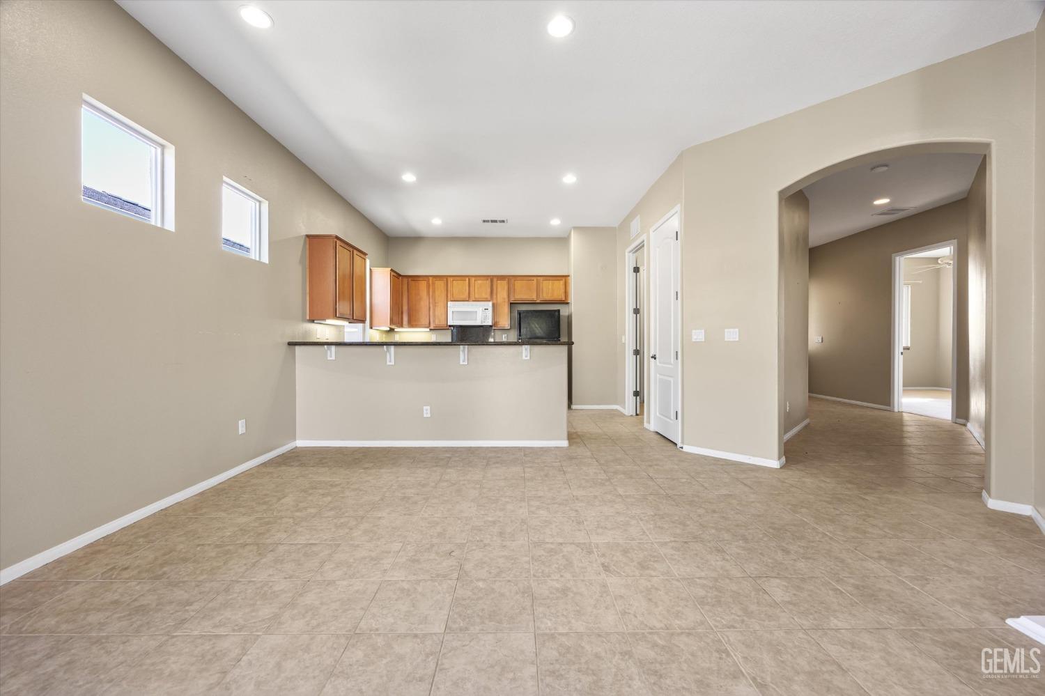 Undisclosed Address Bakersfield, CA 93306 - Photo 12 of 35 a view of a kitchen with a refrigerator and a sink