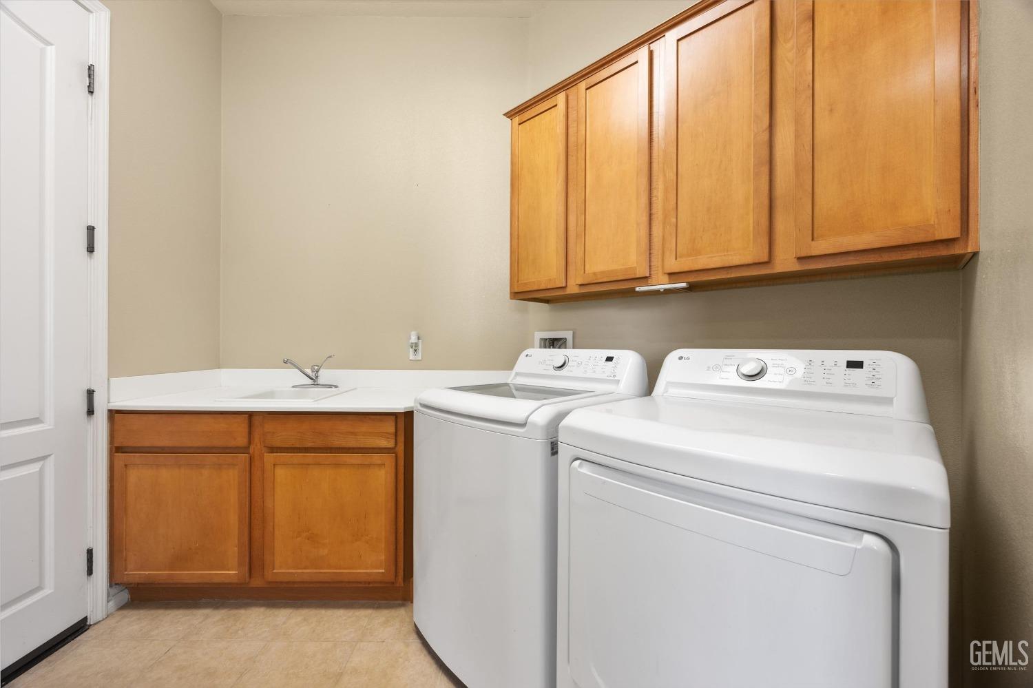 Undisclosed Address Bakersfield, CA 93306 - Photo 29 of 35 a utility room with dryer and washer