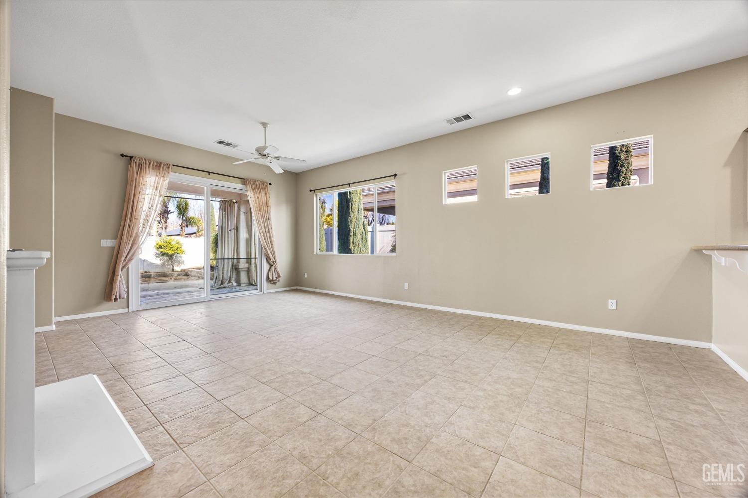 Undisclosed Address Bakersfield, CA 93306 - Photo 7 of 35 a view of an empty room with a window