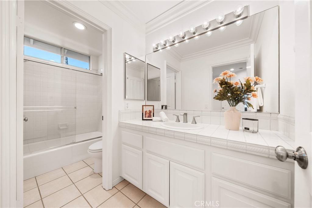 34152 Cambridge Road Dana Point, CA 92629 - Photo 23 of 70 a bathroom with a sink and a mirror