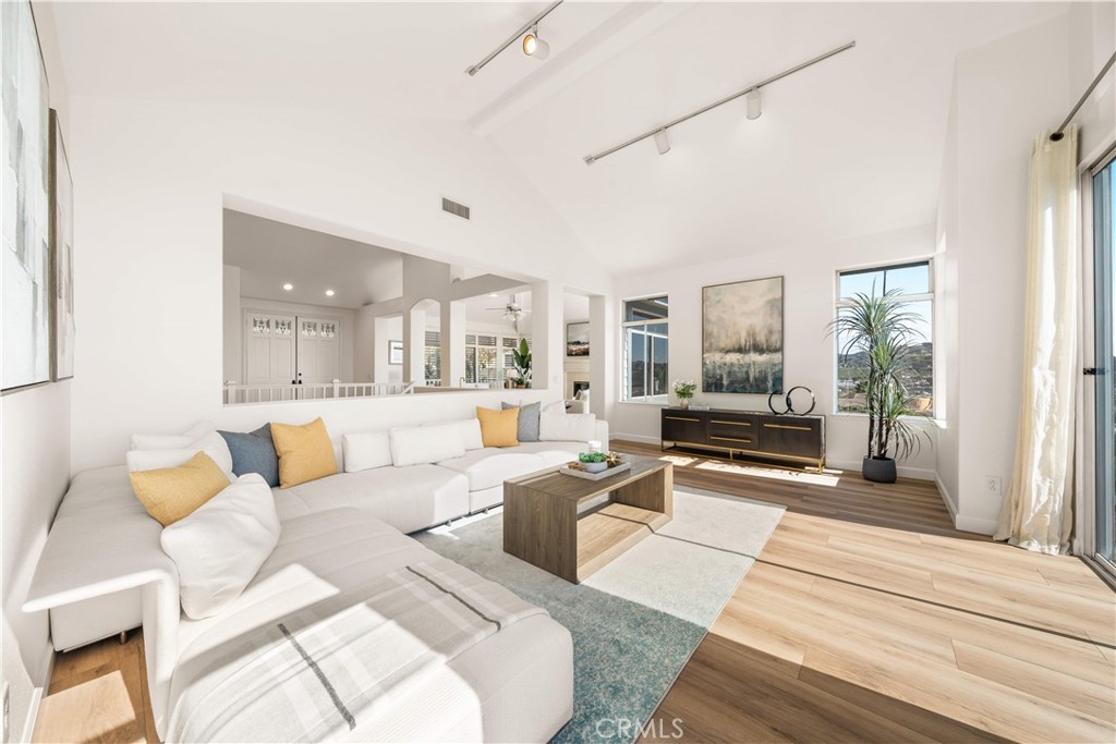 34152 Cambridge Road Dana Point, CA 92629 - Photo 25 of 70 a living room with furniture and a large window