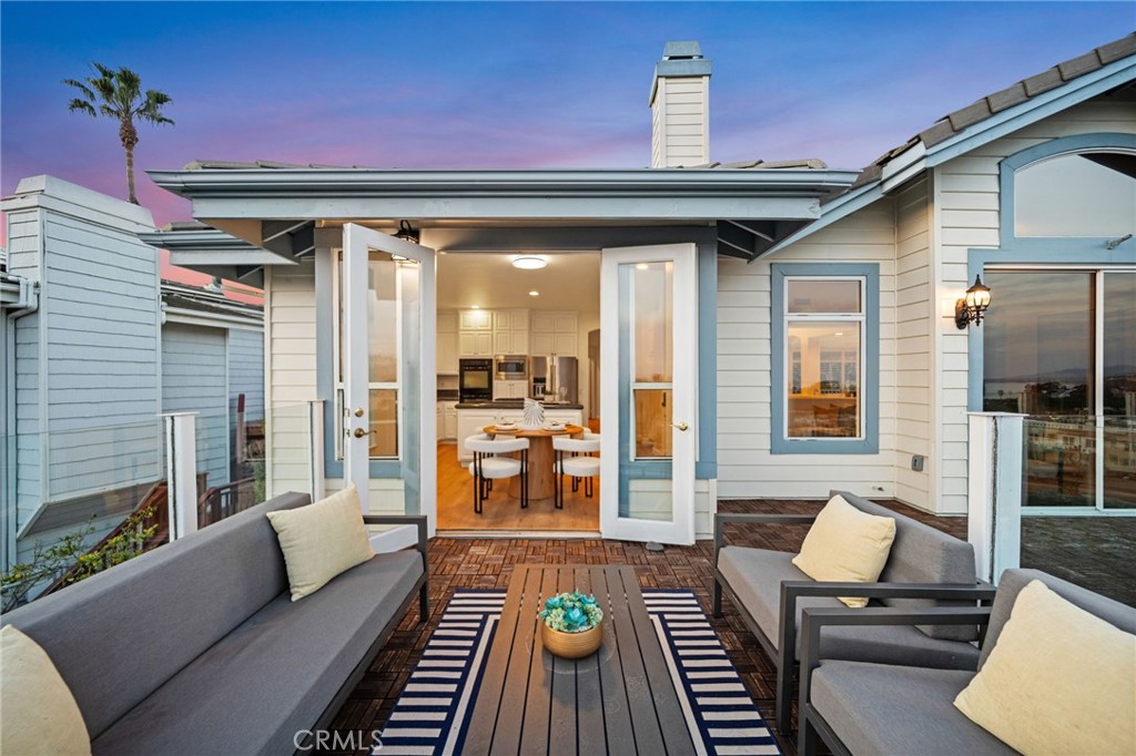 34152 Cambridge Road Dana Point, CA 92629 - Photo 32 of 70 a living room with furniture and wooden floor