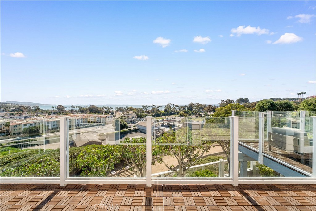 34152 Cambridge Road Dana Point, CA 92629 - Photo 38 of 70 a view of a lake from a balcony