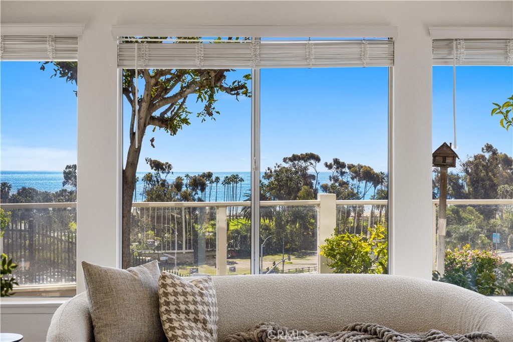 34152 Cambridge Road Dana Point, CA 92629 - Photo 48 of 70 a view of a porch with furniture and floor to ceiling window