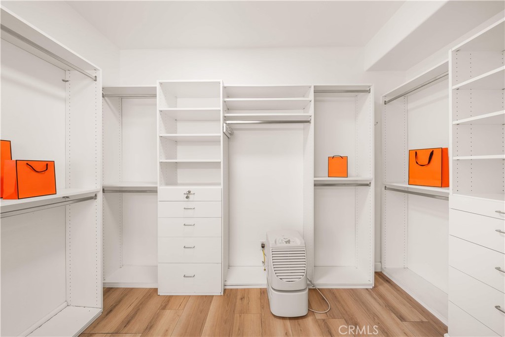 34152 Cambridge Road Dana Point, CA 92629 - Photo 52 of 70 a view of empty room with wooden floor and fan