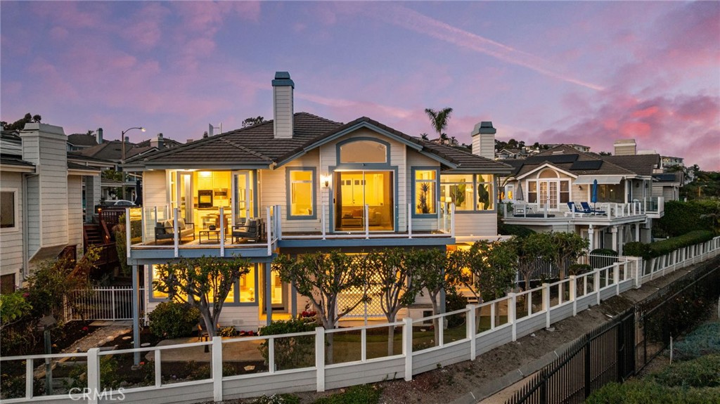 34152 Cambridge Road Dana Point, CA 92629 - Photo 6 of 70 a front view of a house with a porch
