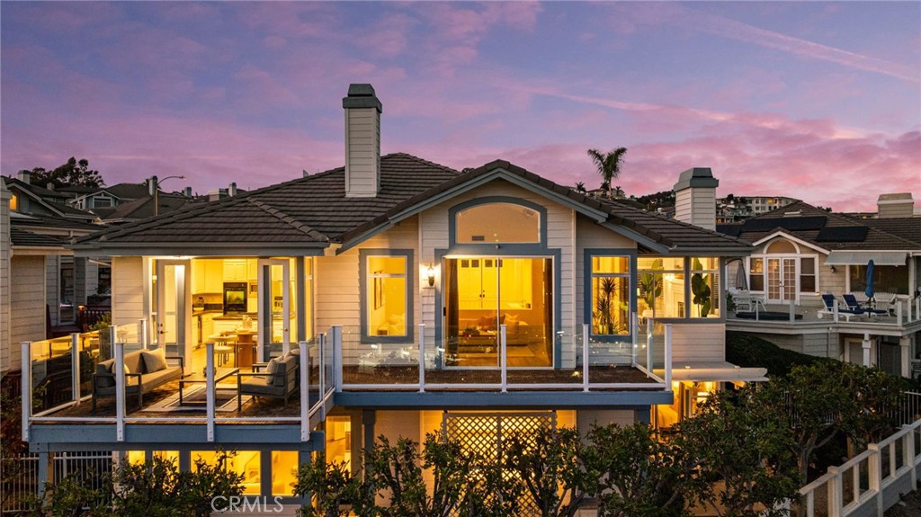 34152 Cambridge Road Dana Point, CA 92629 - Photo 7 of 70 a front view of a house with a ocean view