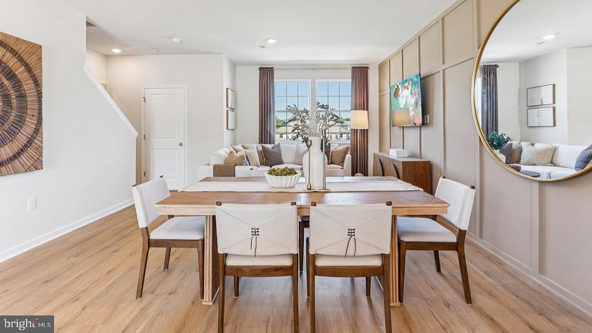 159 Sandy Rdg Road Sicklerville, NJ 08081 - Photo 35 of 36 a dining room with furniture and wooden floor