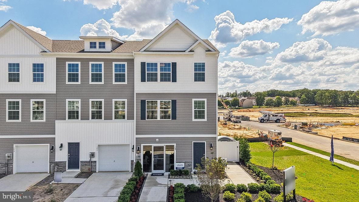 159 Sandy Rdg Road Sicklerville, NJ 08081 - Photo 36 of 36 a view of a lake with a building in the background
