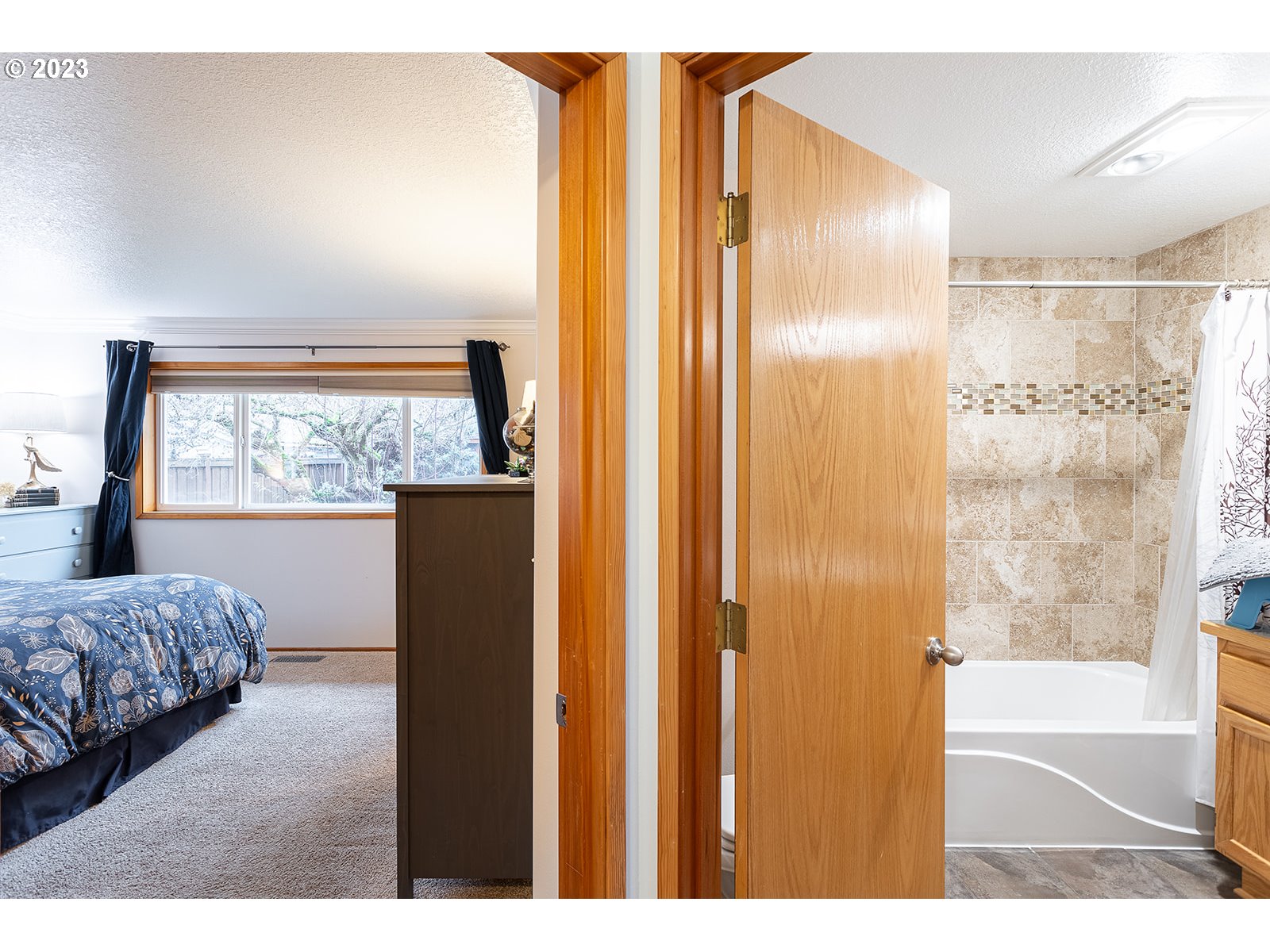4010 Torrington Avenue Eugene, OR 97404 - Photo 17 of 35 a bathroom with a bathtub and a shower