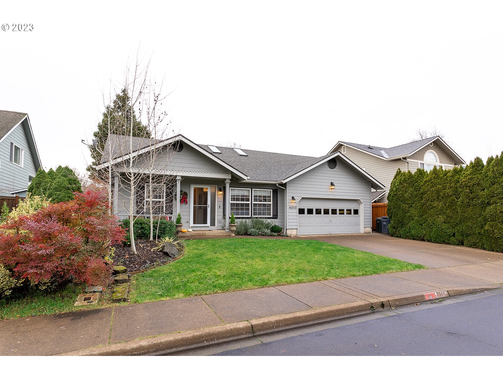 4010 Torrington Avenue Eugene, OR 97404 - Photo 2 of 35 a view of a house with a yard and large tree