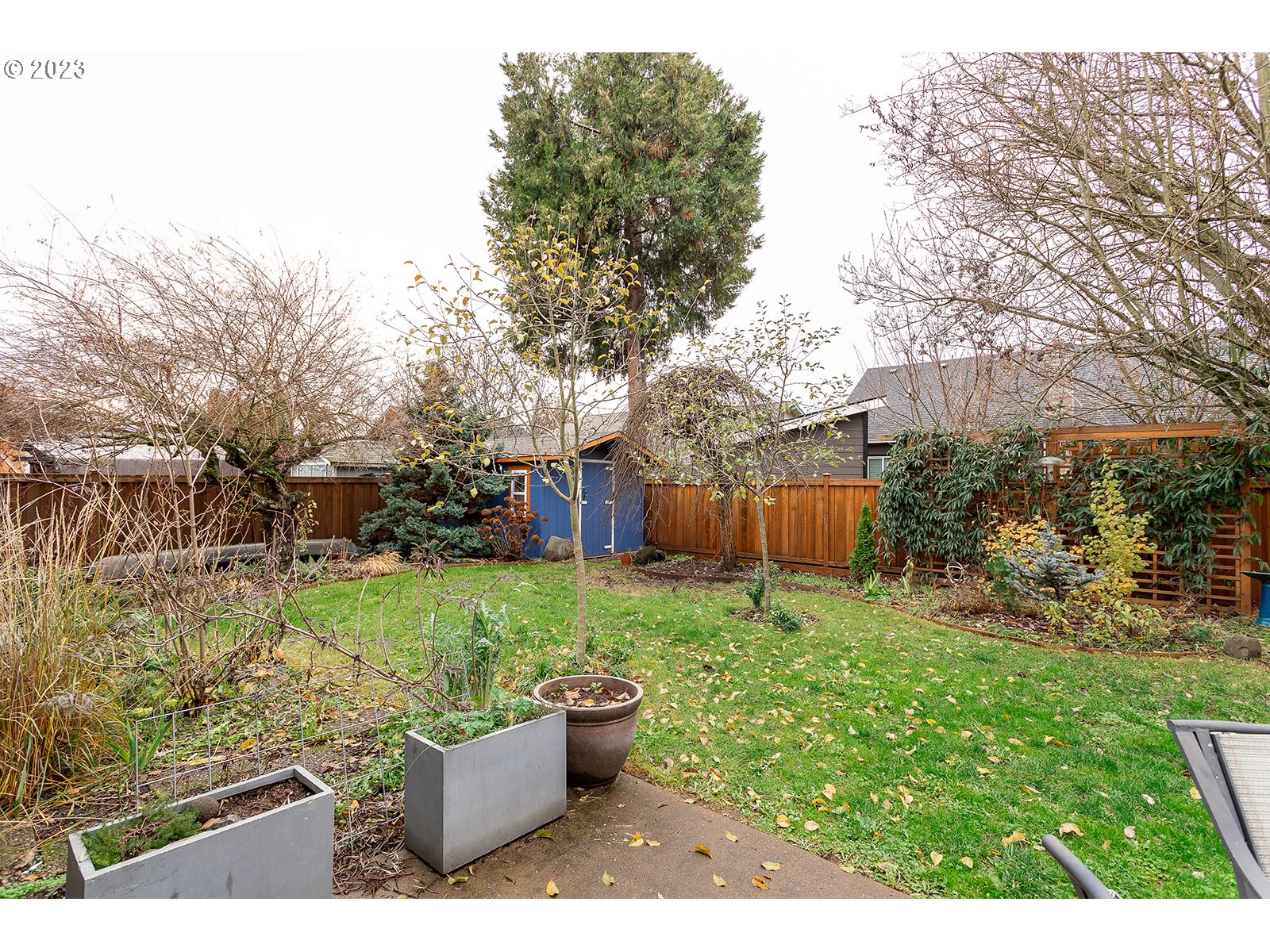 4010 Torrington Avenue Eugene, OR 97404 - Photo 31 of 35 a backyard of a house with a yard and outdoor seating