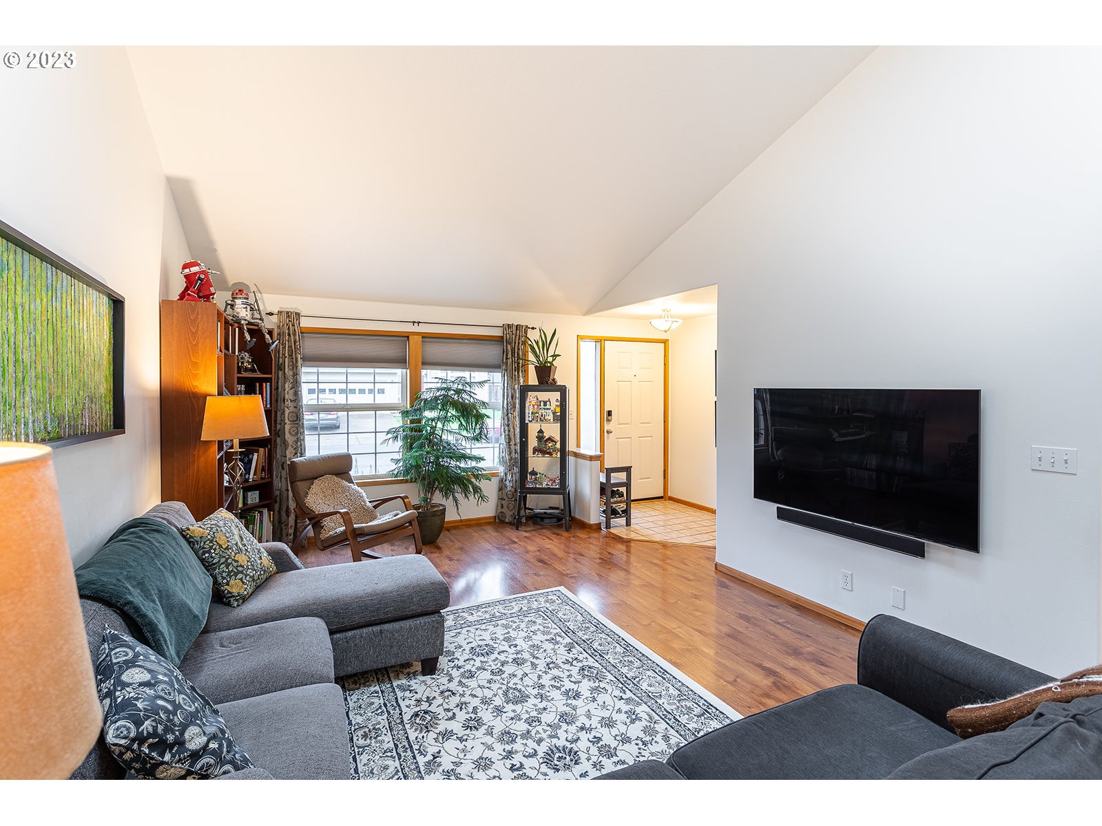4010 Torrington Avenue Eugene, OR 97404 - Photo 5 of 35 a living room with furniture and a flat screen tv