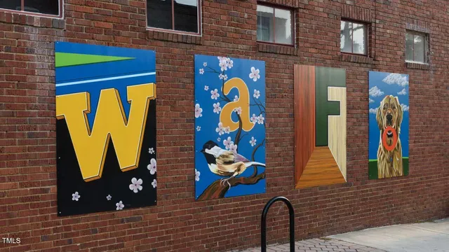 a view of a building with a street