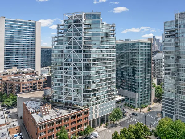 a view of a city with tall buildings
