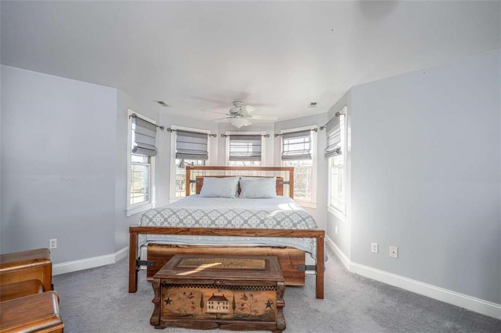 6729 Big Texas Valley Road Northwest Rome, GA 30165 - Photo 17 of 32 a living room with stainless steel appliances granite countertop furniture and a fireplace