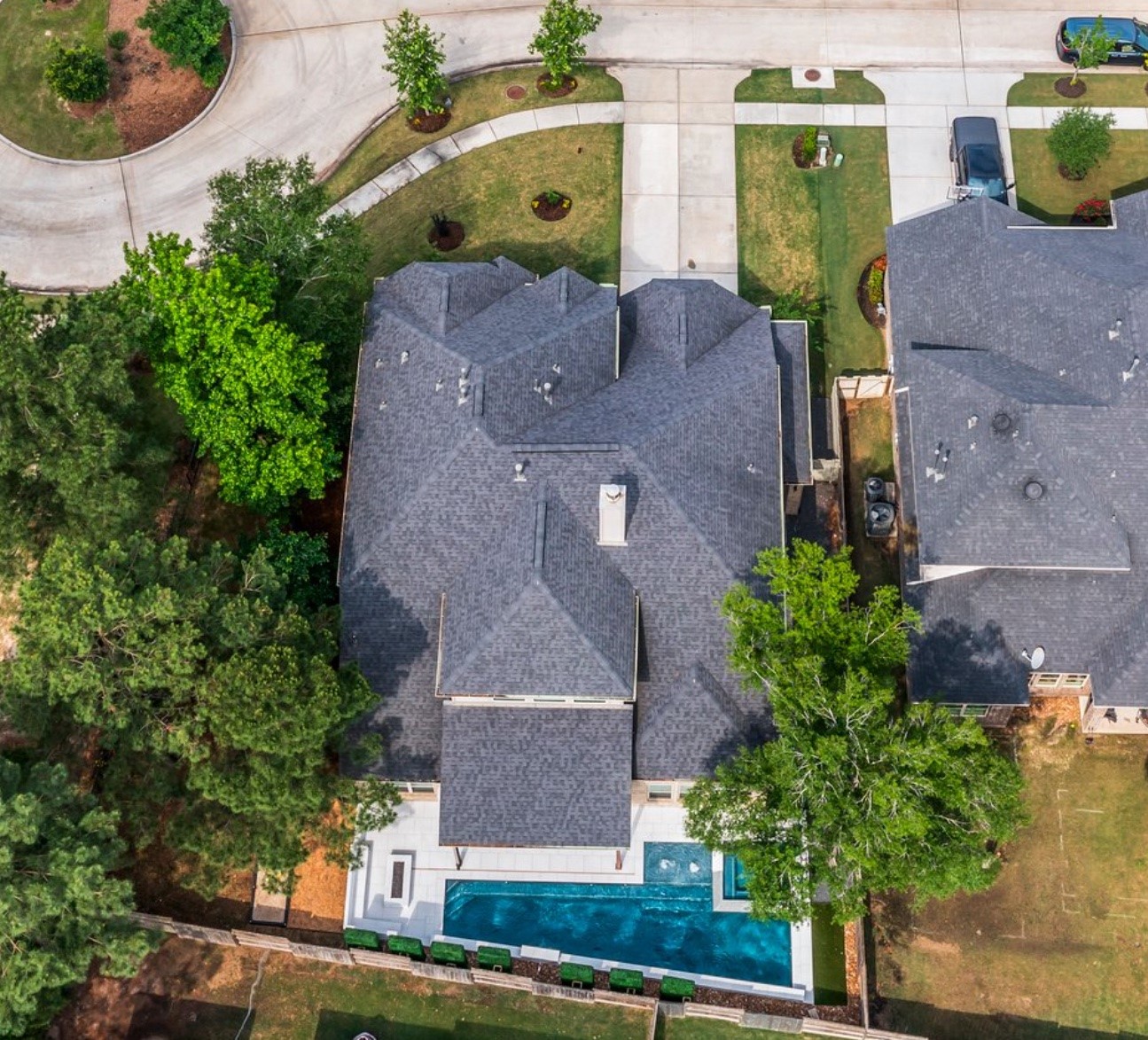 1053 Bat Hawk Court Conroe, TX 77385 - Photo 50 of 50 an aerial view of a house with yard and large trees