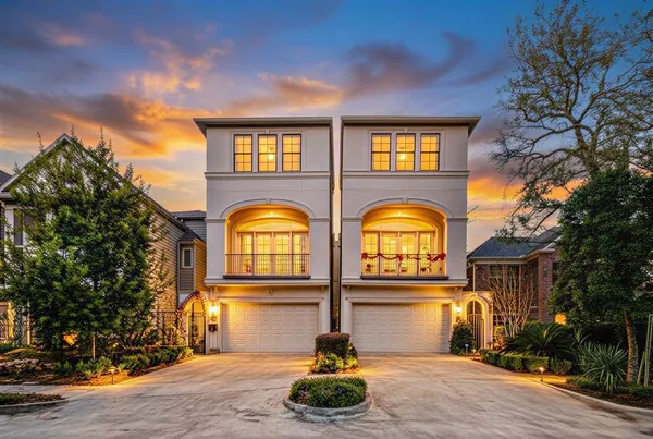 a view of a kitchen with wooden floor and cabinets