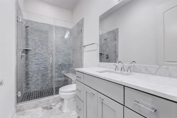 an empty room with a ceiling fan and a window