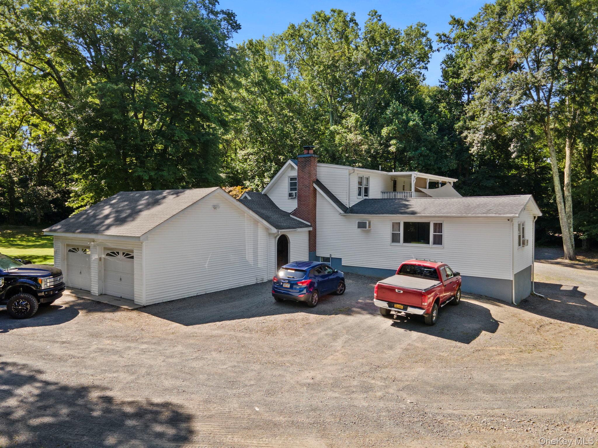 2431 Albany Post Road Montgomery, NY 12586 - Photo 4 of 44 a car parked in front of a house