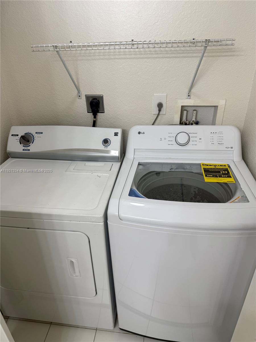 15422 Southwest 284th Street, Unit 7202 Homestead, FL 33033 - Photo 12 of 13 a utility room with dryer and washer