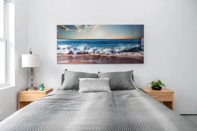 a view of a lake with houses in the back