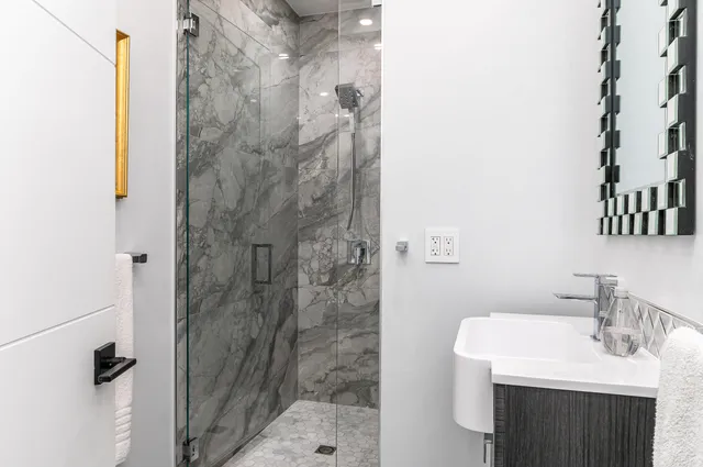 a view of an ocean house and swimming pool