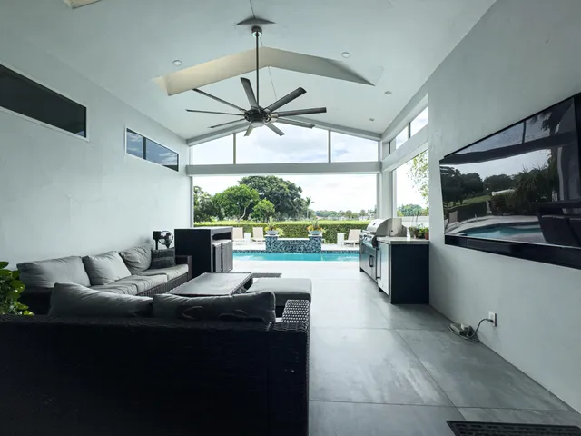 a bathroom with a mirror and a bathtub