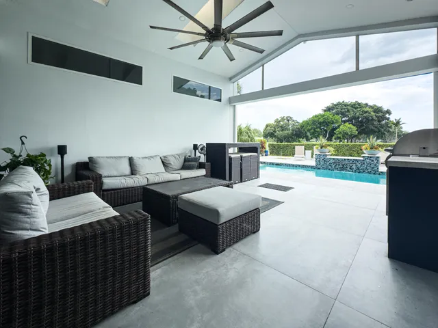 a dinning table and chairs in a room