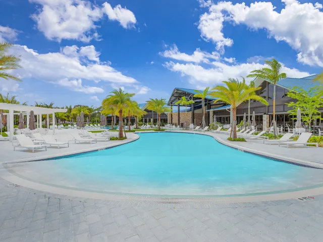 a open kitchen with a table and chairs in it