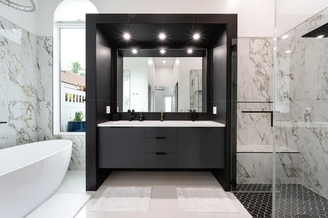 a bathroom with a bathtub and a sink