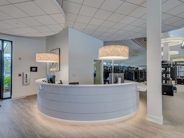 a view of a swimming pool with an outdoor space and seating area