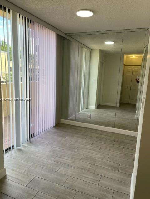 2931 Southwest 87th Terrace, Unit 1923 Davie, FL 33328 - Photo 11 of 15 a view of entryway with wooden floor