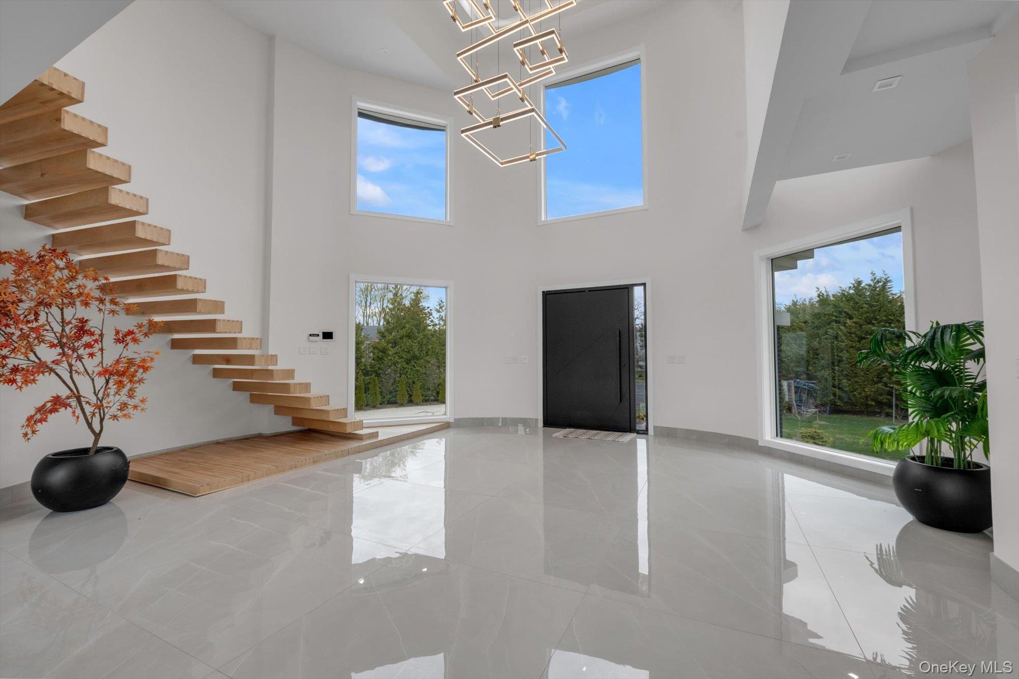 190 Curtis Road Woodmere, NY 11598 - Photo 2 of 46 a view of an entryway with stairs