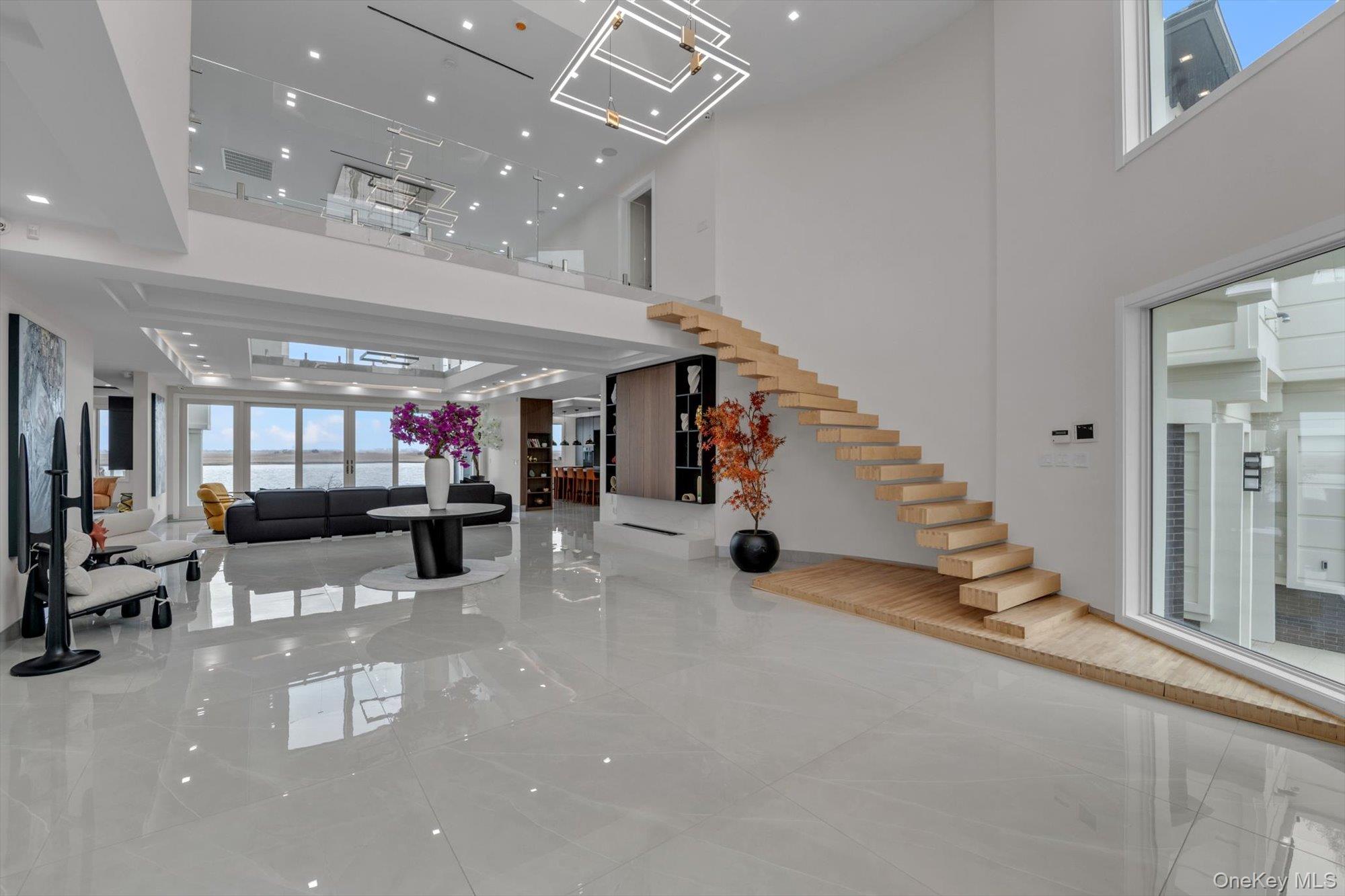 190 Curtis Road Woodmere, NY 11598 - Photo 3 of 46 a view of a room with lots of gym equipment