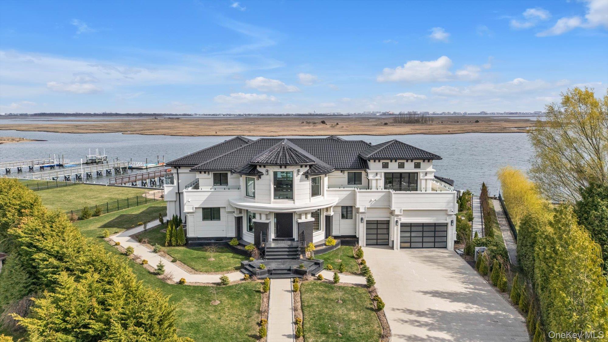 190 Curtis Road Woodmere, NY 11598 - Photo 34 of 46 a aerial view of a house with a ocean view