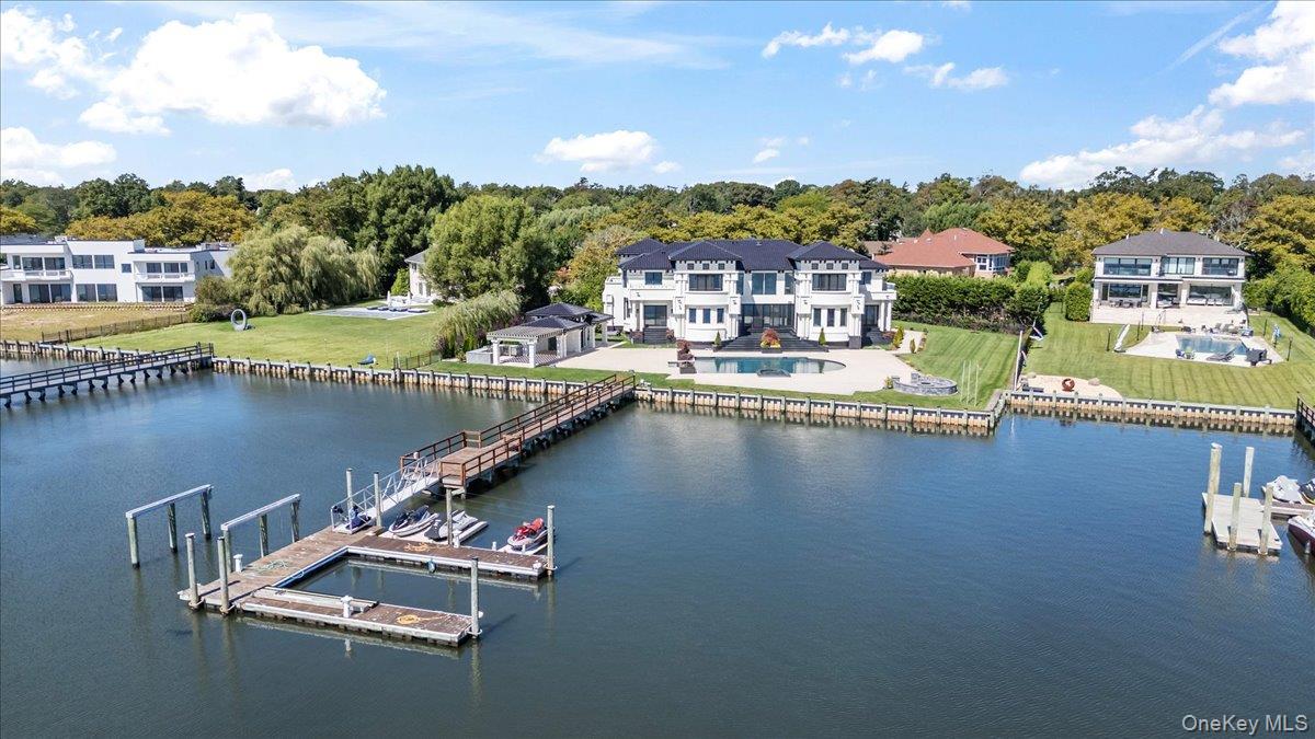 190 Curtis Road Woodmere, NY 11598 - Photo 42 of 46 a view of a city with swimming pool and an outdoor seating