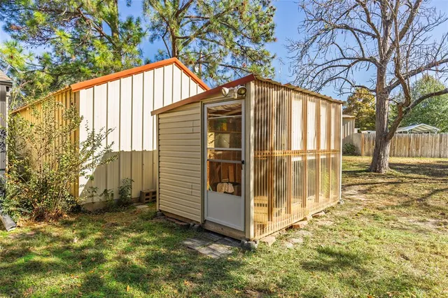 a view of backyard of small house