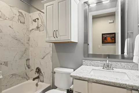 an aerial view of a city with lots of residential buildings