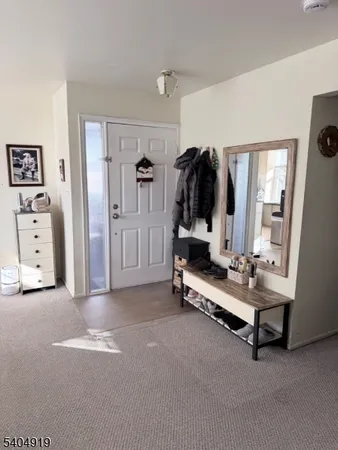 a view of game room with gym equipment