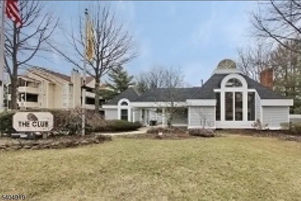 a front view of a house with yard