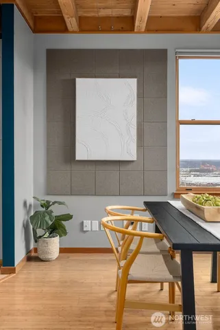 a kitchen with a table and chairs